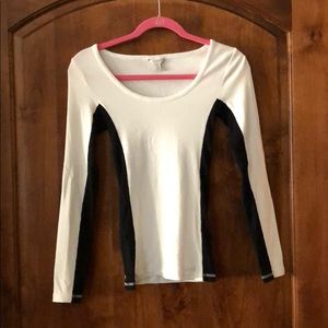 Guess black and white woman’s top